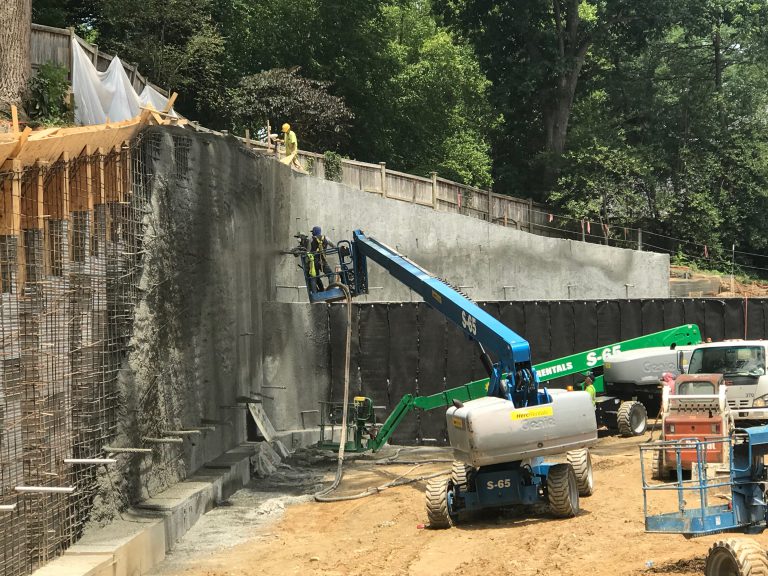 Shotcrete application on a commercial soil nail wall