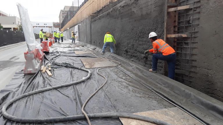 Shotcrete application on a commercial retaining wall